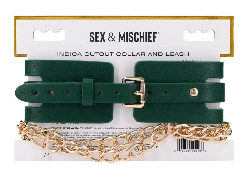 Emerald green faux leather collar with cutout detailing and a gold chain leash