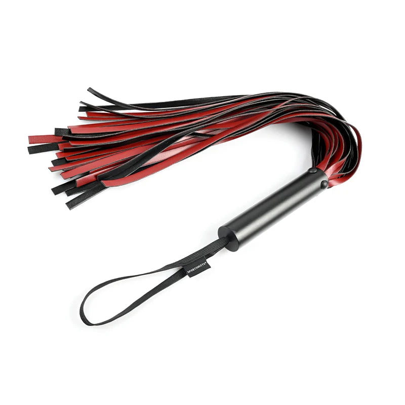 Flogger with red and black faux leather falls on a black metal handle with a hanging loop