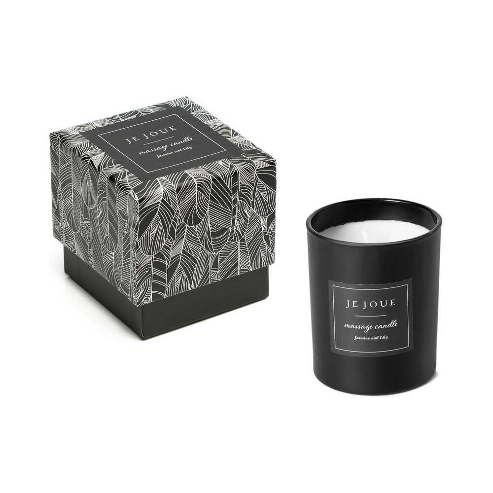 Je Joue massage candle in a glass vessel with its patterned gift box