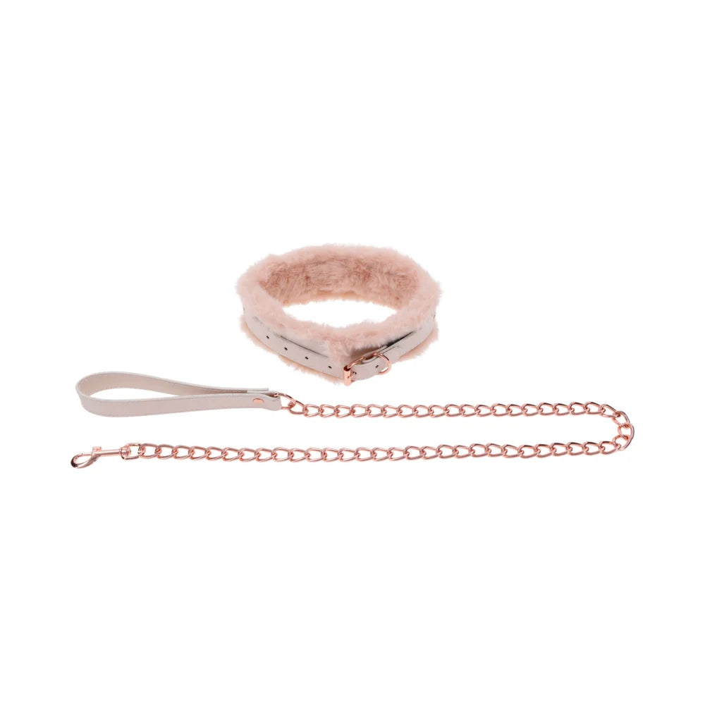 Peach faux fur lined collar with a detachable rose gold chain leash