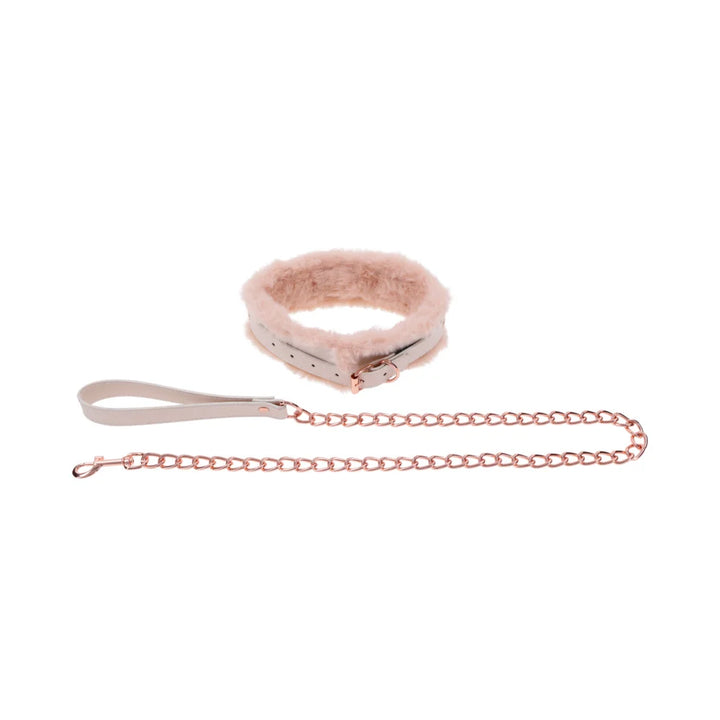 Peach faux fur lined collar with a detachable rose gold chain leash