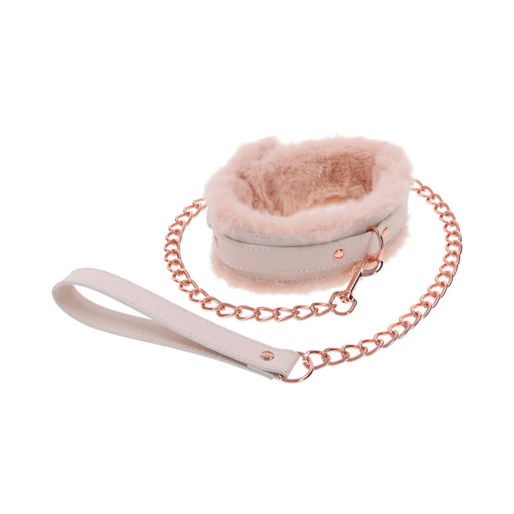 Peach faux fur lined collar with a detachable rose gold chain leash