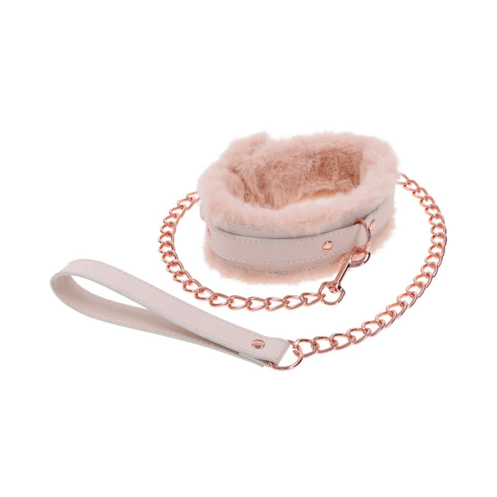 Peach faux fur lined collar with a detachable rose gold chain leash