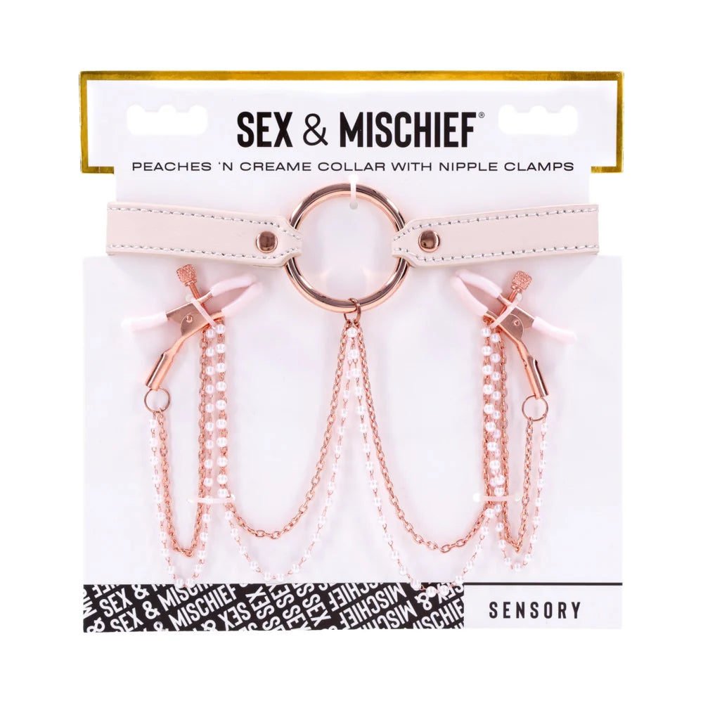Pale peach faux leather collar with rose gold hardware and pearl chains running to two nipple clamps