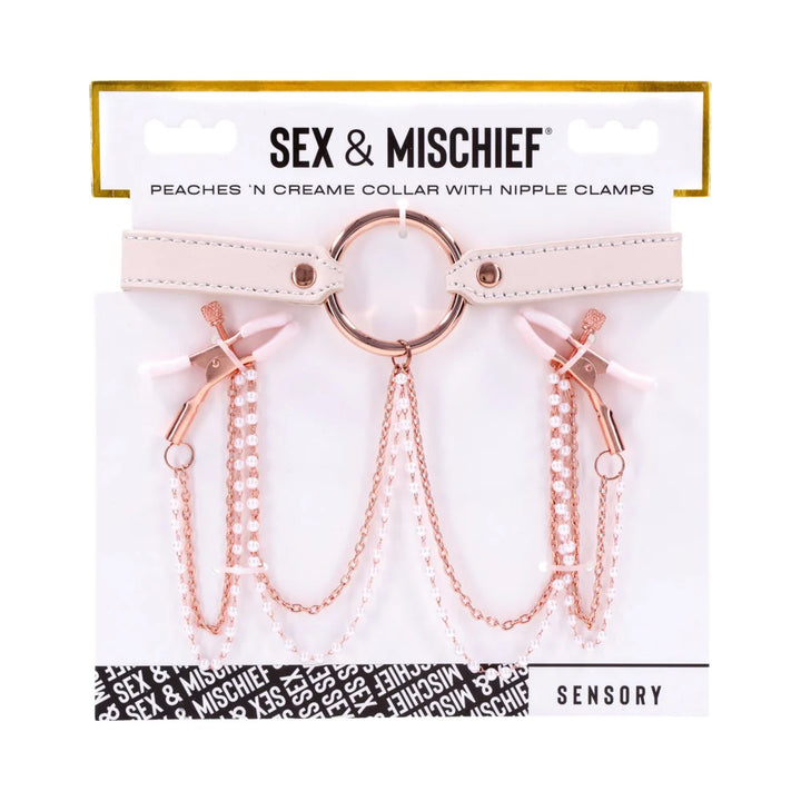 Pale peach faux leather collar with rose gold hardware and pearl chains running to two nipple clamps