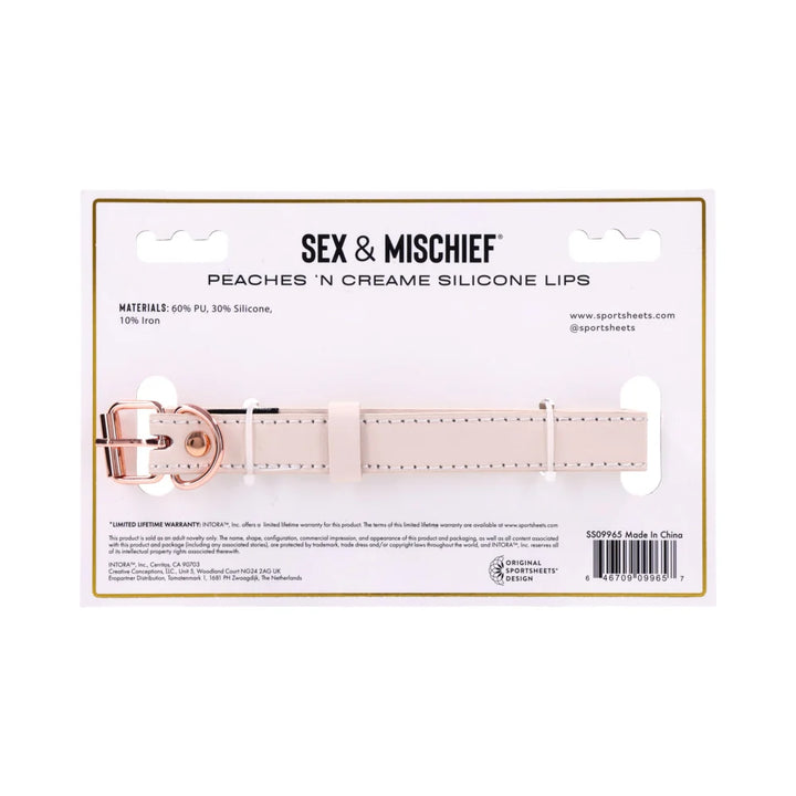 Open-mouth lip-shaped gag in pearlescent peach silicone on a faux leather strap with rose gold buckle