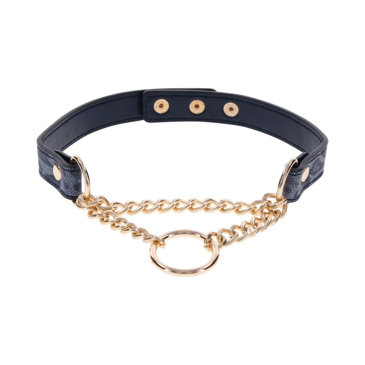 Blue animal print faux leather day collar with a draped gold chain and a gold ring at the center