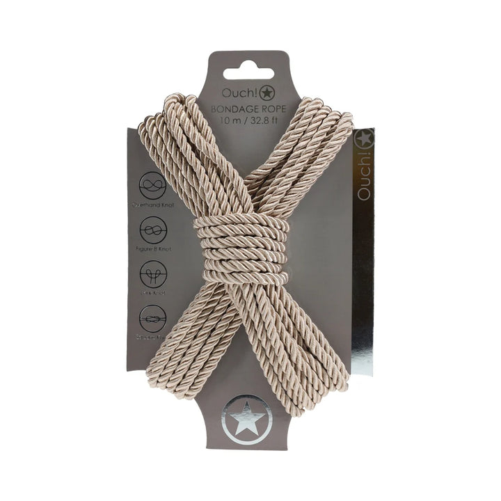 Ouch! bondage rope in gold, coiled in a figure eight on its branded backing card