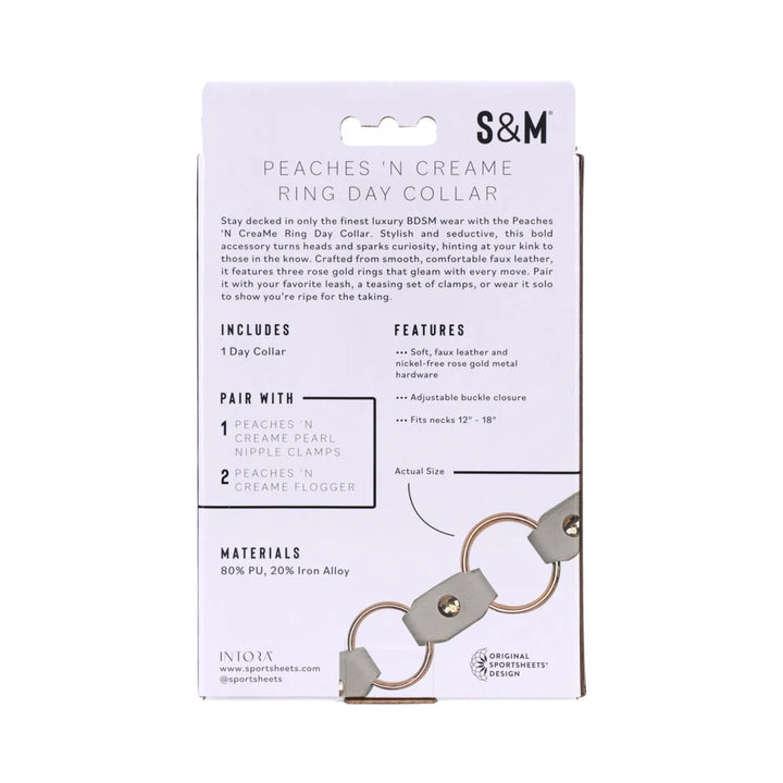 Smooth peach faux leather day collar with three rose gold rings across the front