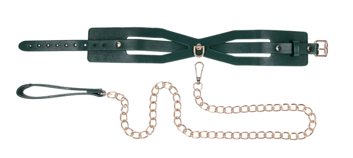 Emerald green faux leather collar with cutout detailing and a gold chain leash