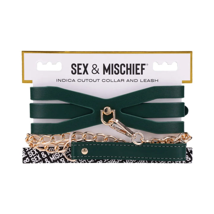 Emerald green faux leather collar with cutout detailing and a gold chain leash