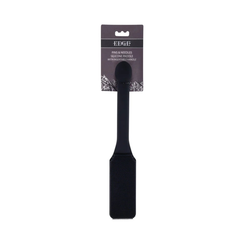Black silicone paddle with a head covered in fine needle-like bristles and a long handle