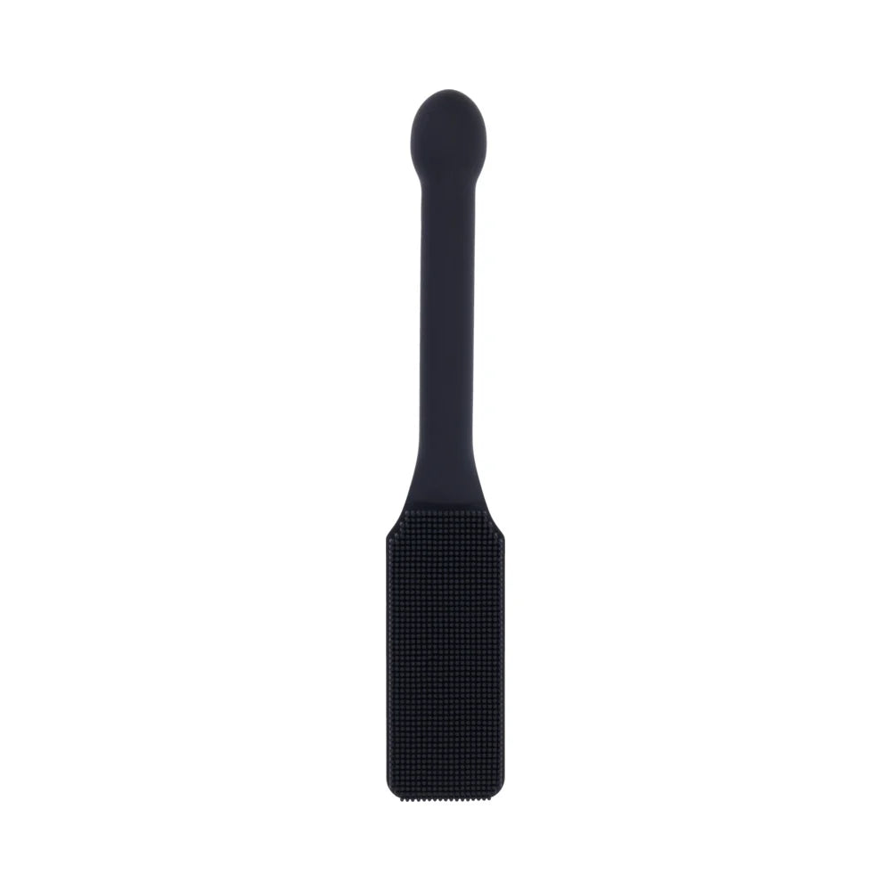 Black silicone paddle with a head covered in fine needle-like bristles and a long handle