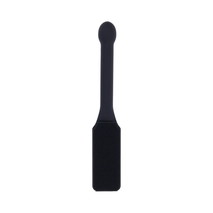 Black silicone paddle with a head covered in fine needle-like bristles and a long handle