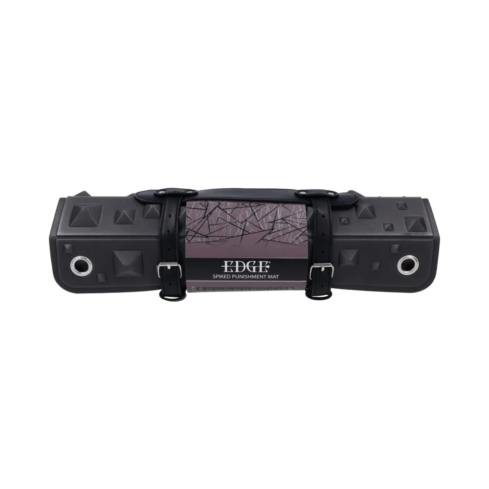 Black foam mat covered in pyramid spikes, shown rolled into its buckled faux leather holster