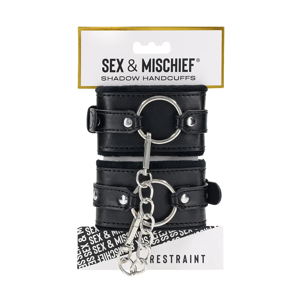Black faux leather cuffs with silver O-ring connectors and a removable chain with gate clips