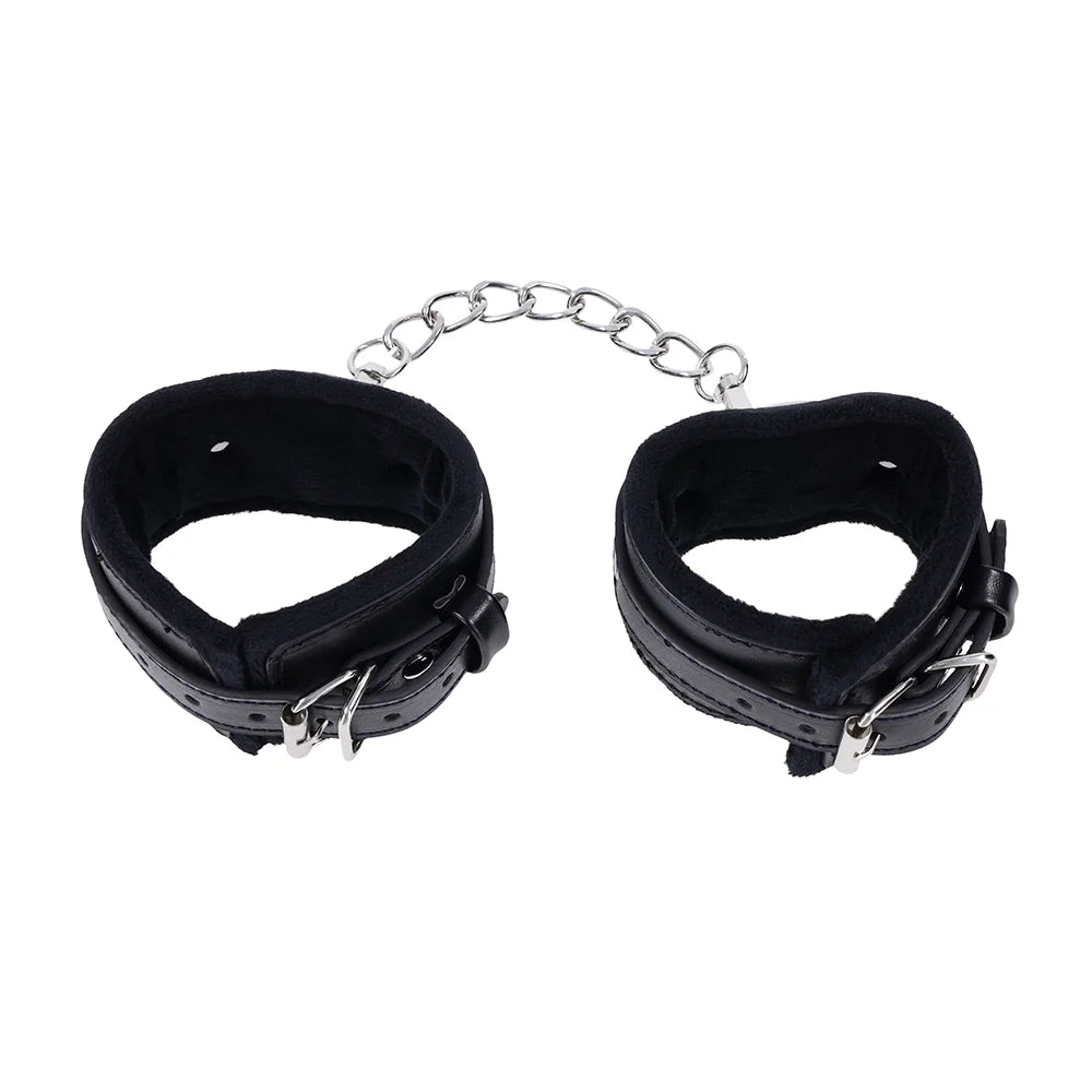 Black faux leather cuffs with silver O-ring connectors and a removable chain with gate clips