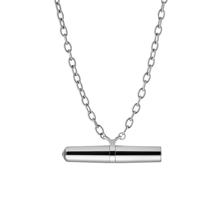 Crave Tease Necklace pendant removed from the chain to show the bullet vibrator underneath