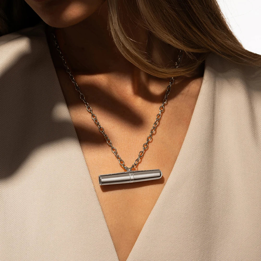 Crave Tease Collection shown with all three wearing options laid out together: necklace, ring, and standalone