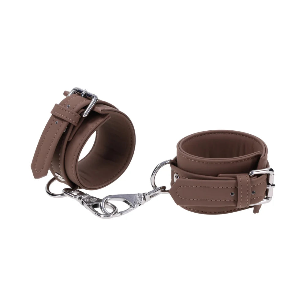Dawn Dream: Mocha brown cashmere-touch silicone wrist cuffs with silver buckles and gate clips joined by a short chain