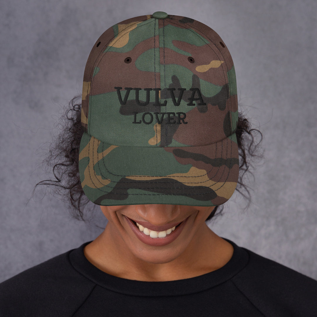 Vulva Lover Dad Cap (Black Text), green camo colorway, front view | MOTHERLODE